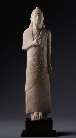 Limestone votive figure