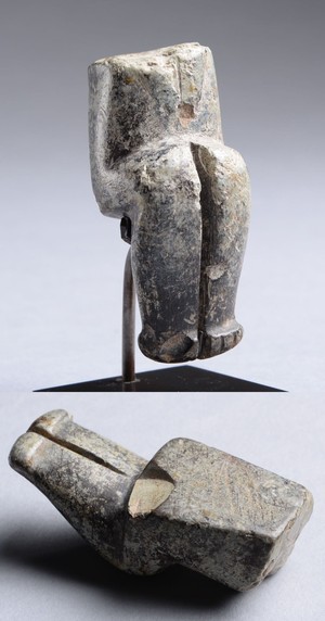 picrolite cruciform-figure fragment.