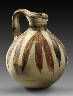 Jug with palm leaves